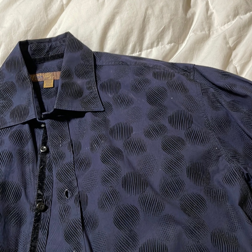 Men’s Dark blue long sleeve shirt with black textured patterns.